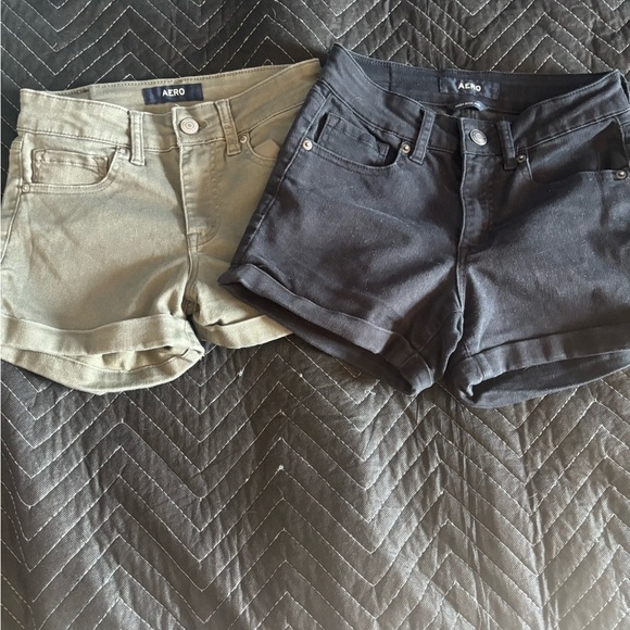 2 Pair Aero Shorts. Size 0. Black & Green great condition. Stretch, soft, cuffed - Picture 1 of 4